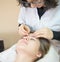 Woman at the salon for Professional eyebrow shaping