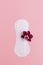 Woman sanitary pad with orchid flower