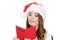 Woman in santa claus hat reading letter