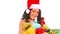 Woman in Santa hat holding stack gift box