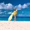 Woman with sarong at beach