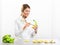 Woman scientist coloring bananas; artificial color