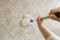 Woman scrubbing floor with a mop