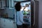 Woman Searching Food In Refrigerator