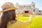 Woman seen from behind taking photo of Venice Square