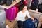 Woman selecting handy trunk in store