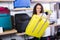 Woman selecting handy trunk in store