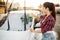 Woman on self-service car wash, carwash process