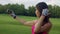 Woman selfie. Asian woman selfi in park. Sport girl selfie photo on phone