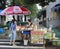 Woman selling breakfast on the roadside