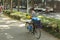 Woman selling flowers at the street in Shanghai, China