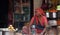 Woman selling fried street food in Pushkar, India