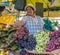 Woman selling fruits at tienda market