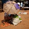 Woman selling green bananas in Uganda