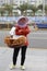 Woman selling mahua in xiamen city, china