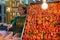 Woman selling pomegranate in a Xi`an street market