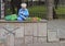 Woman is selling vegetables outdoor in Kaunas, Lithuania