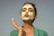 Woman send air kiss with cream mask on face. Beauty, nature, youth, skin care, rejuvenation concept.
