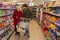 Woman and senior woman going for shopping in the supermarket