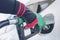 Woman service staff Handle pumping gasoline fuel nozzle to refuel