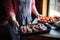 woman serving grilled venison steaks