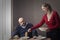 Woman serving pasta to husband