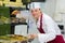 Woman serving at takeaway buffet counter