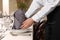 Woman setting table in restaurant, closeup. Professional butler courses