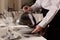 Woman setting table in restaurant, closeup. Professional butler courses