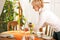 Woman setting the table for tea of coffee time