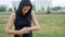 Woman setting up the fitness smartwatch for running. Sportswoman checking watch device