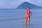 Woman shape big and bikini pink on beach