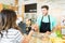 Woman Shopping Food Items In Grocery Store