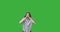 Woman shouting and listening over green background