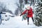 Woman Shoveling her Parking Lot