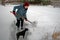 Woman shoveling snow