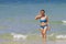 Woman show bikini blue idyllic on blue water