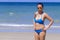 Woman show bikini blue idyllic with sunlight on beach