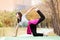 Woman show Yoga Half-Bow Pose - Ardha Dhanurasana