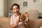 Woman showing stuffed chocolate easter egg