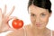 Woman showing tomato