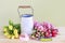 Woman shows how to make spring bouquet with tulip, hyacinth and carnation flowers, tutorial