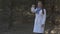 a woman shows a medical mask, an individual means of protection against diseases and coronavirus