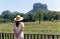 Woman with Sigiriya rock view in Sri Lanka