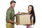 Woman signing for pack delivery with smiling postman