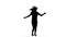 Woman silhouette dancing in slow motion