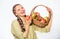 Woman sincere villager carry basket with natural fruits. Lady farmer gardener proud of her harvest. Woman gardener