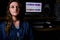 Woman singer sitting in a recording Studio. Vocalist in place of the sound engineer. Portrait of a girl on the recording of a song