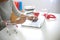 woman sit at computer table work about shopping