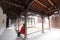 Woman sit in the house of gaoqiu in hengdian studios, adobe rgb